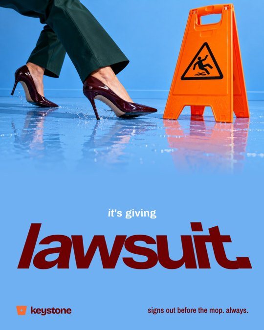 Keystone social post: heels stepping past an orange wet floor sign, it's giving lawsuit